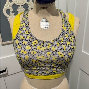 Two vintage Moving Comfort sports bras.